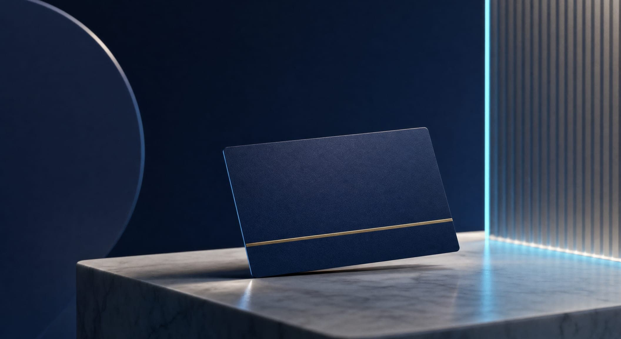 A minimalist dark blue business card with a subtle gold line on a clean stone surface — trustworthy design for a law firm